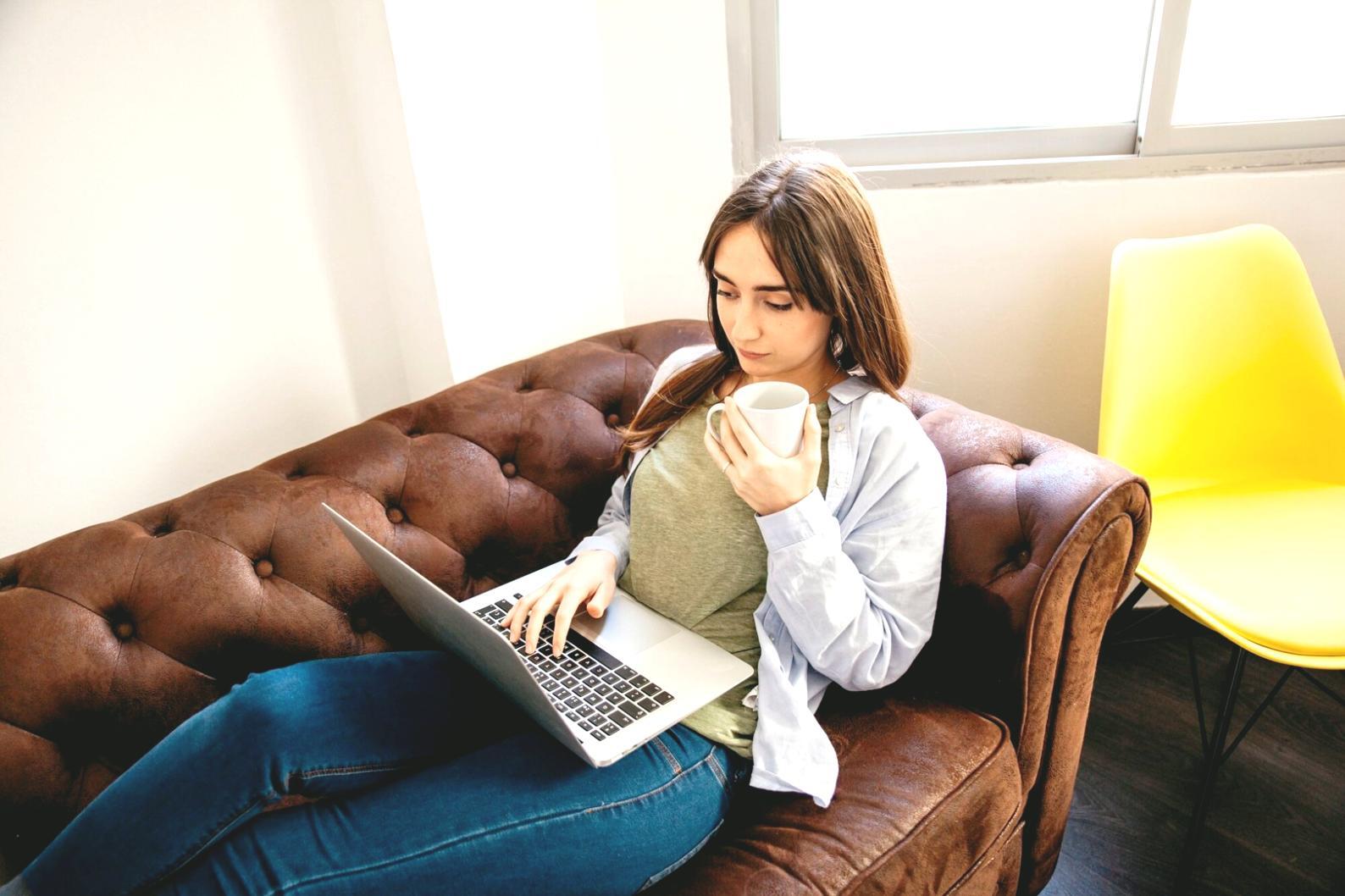 Financial analyst working on valuation models with multiple screens showing spreadsheets and market data